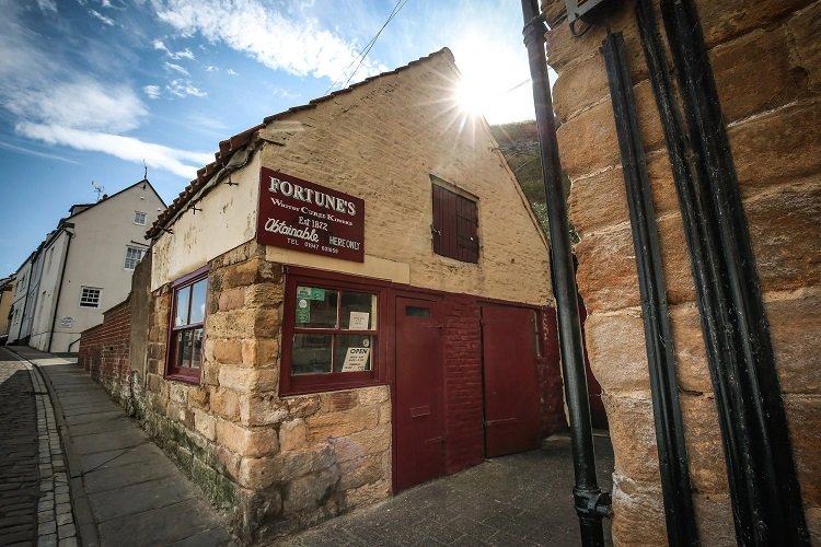 a building with a sign on the side
