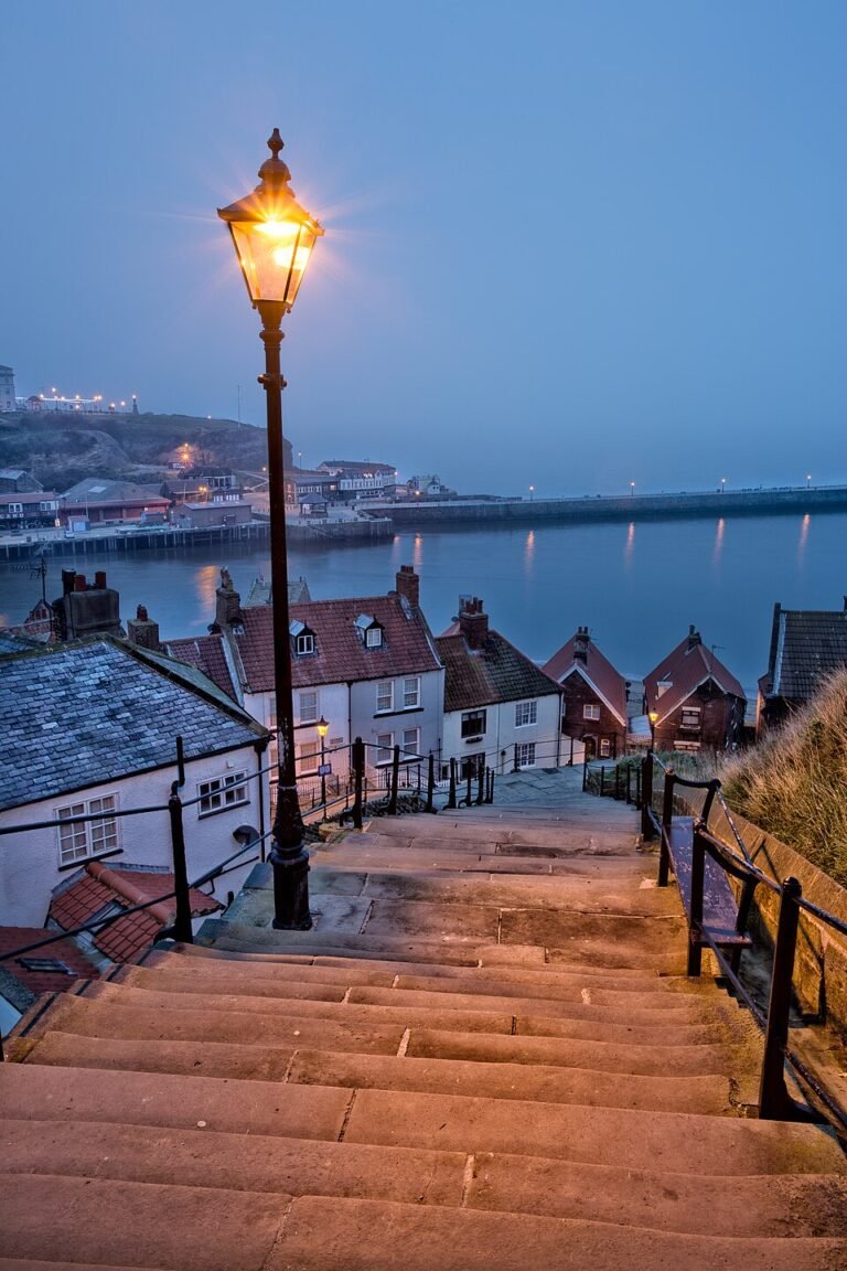 a stairs leading up to a town